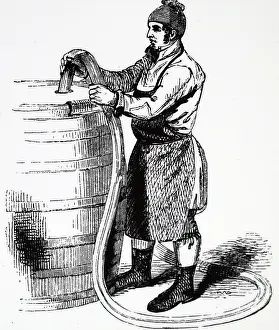 1841: An engraving of Brewing: Filling barrels with