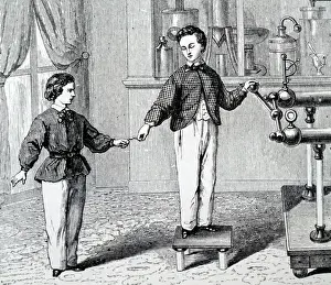 Spark: Engraving depicting boys experimenting with an
