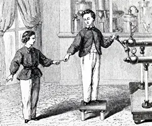 Spark: Engraving depicting boys experimenting with an