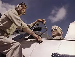 Cadet: Ensign and cadet by cockpit of plane at Naval