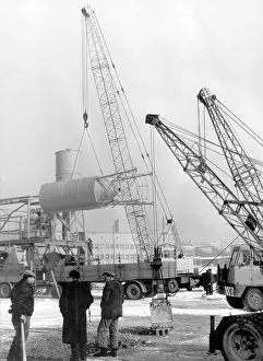 Erecting: Erecting a grain silo using cranes