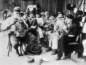Boss: Eric Campbell, Albert Austin and Charles Chaplin in Behind