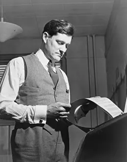 Teletype: Eric Sevareid (1912-1992), reads document ?