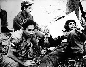 Batista: Ernesto Che Guevara (at right) shown with ?