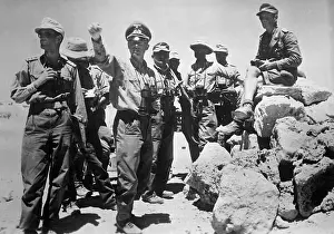 Discusses: Erwin Rommel with German officers, 1942