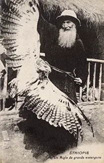 Venerable: Ethiopia - A large eagle, held by a venerable missionary