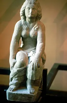Gregorian: Etruscan standstone statuette of a