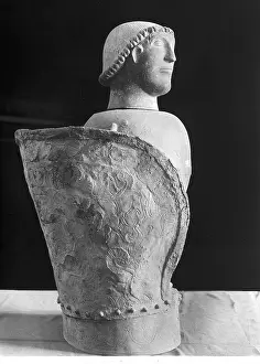 Canopic: Etruscan terracotta canopic vase representing