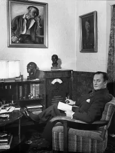 Slippers: Eugen Rex in his living room, 1930s