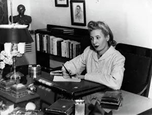 Evita: Eva Peron of Argentina sitting at her desk