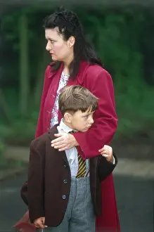 Cuddling: EVACUATION/MOTHER & SON