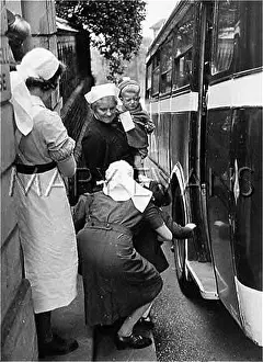 Tearful: EVACUEE GIRL SAYS BYE