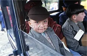 Excitedly: EVACUEES IN CAR