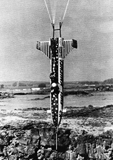 Evel: Evel Knievel and his rocket are suspended ?