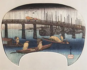 Boatmen: Evening Rain at Eitai Bridge, by Hiroshige