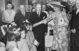 Populists: Evita Peron, visiting an orphanage in Toledo, Spain