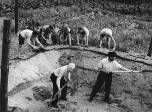 Placing: Excavating an extinguishing pond, 1943