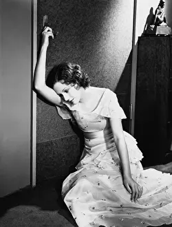 Exhausting: Exhausted woman sitting on the floor