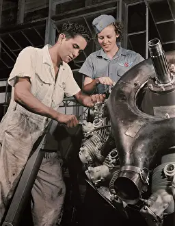 Trainee: An expert mechanic shows a student the tricks