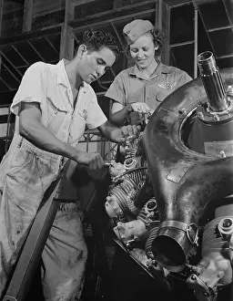 Propeller: An expert mechanic shows a student the tricks