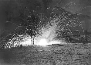 Explodes: Explosion of a bazooka shell during the fighting in Kurland