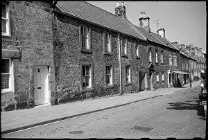 An exterior view of the front elevations of houses
