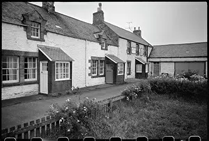 Dressings: An exterior view of The Ship Inn and two adjacent