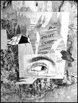 Grafitti: Eye and grafitti on wall Italy