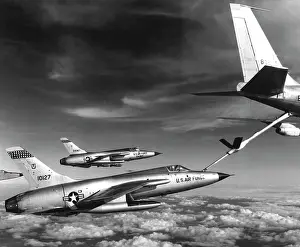 F 105: F-105 Thunderchief planes pull up to a KC-135
