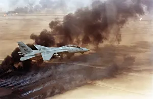 Kuwaiti: F-14 fighter in flight over burning Kuwaiti ?