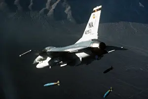 Unguided: F-16 Fighter releasing three 2000-pound ?