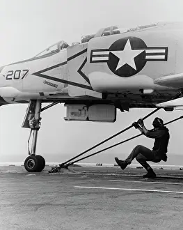 Catapult: An F-4B Phantom II fighter plane is readied