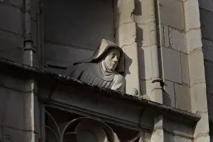 Bourges: Facade relief of woman at window, Palais Jacques