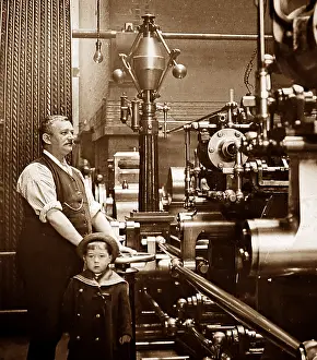 Stationary: Factory or mill steam engine driver and his son