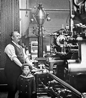 Stationary: Factory or mill steam engine driver and his son