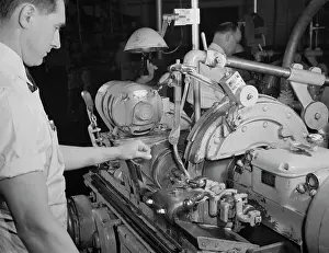 Workbench: Factory worker making spring collets to further