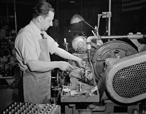 Workbench: Factory worker making spring collets to further