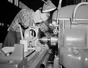 Accuracy: Factory worker producing 37mm guns and gun mounts, 1942