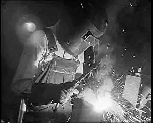 Blowtorch: A Factory Worker Using a Blowtorch