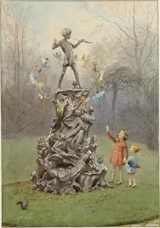 Fairies flying round statue of Peter Pan