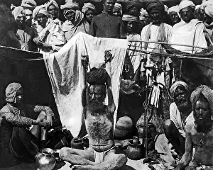 Ascetic: Fakir with raised hands, India