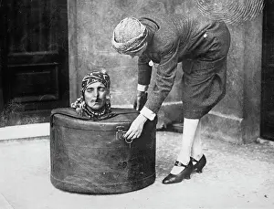 Hatbox: The fakir Sunahya in a hatbox. About