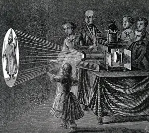 Lanterns: A family enjoying a magic lantern show