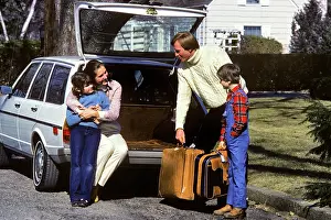Tailgate: Family of Four Getting Ready For Trip Mother and Daught