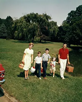 Picniking: Family Going On A Picnic