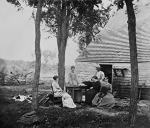 Osullivan: Family group before the house in which Confederate