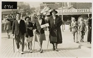 Grenville Collins / Tom Gillmor Collection: Family Group out for a seaside walk