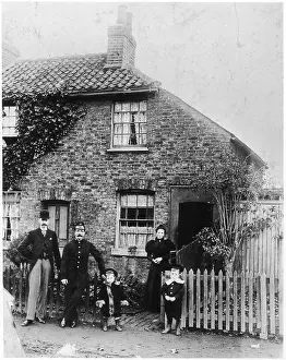 Hornsey: FAMILY OUTSIDE HOUSE