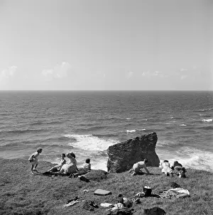 Outcrops: Family picnic on a cliff