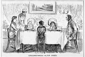 Portions: Family seated around dinner table